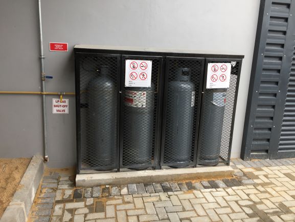 Gas bottles in cage